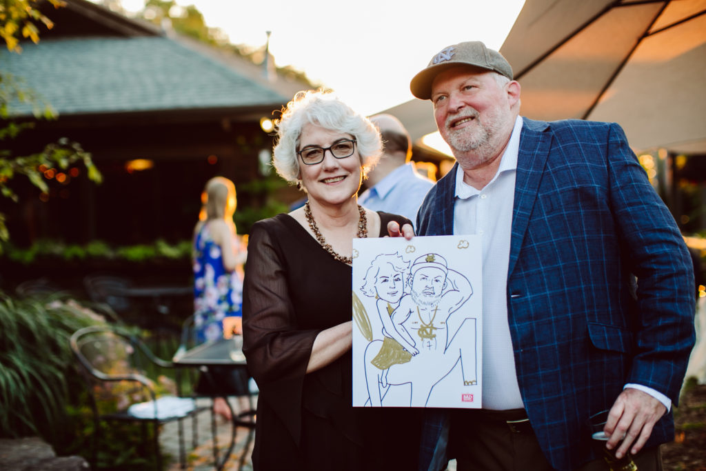 Jess's mom and dad posed for a Bad Drawings and are depicted as a centaur and UNC Carolina fan. A "cen-tarheel."